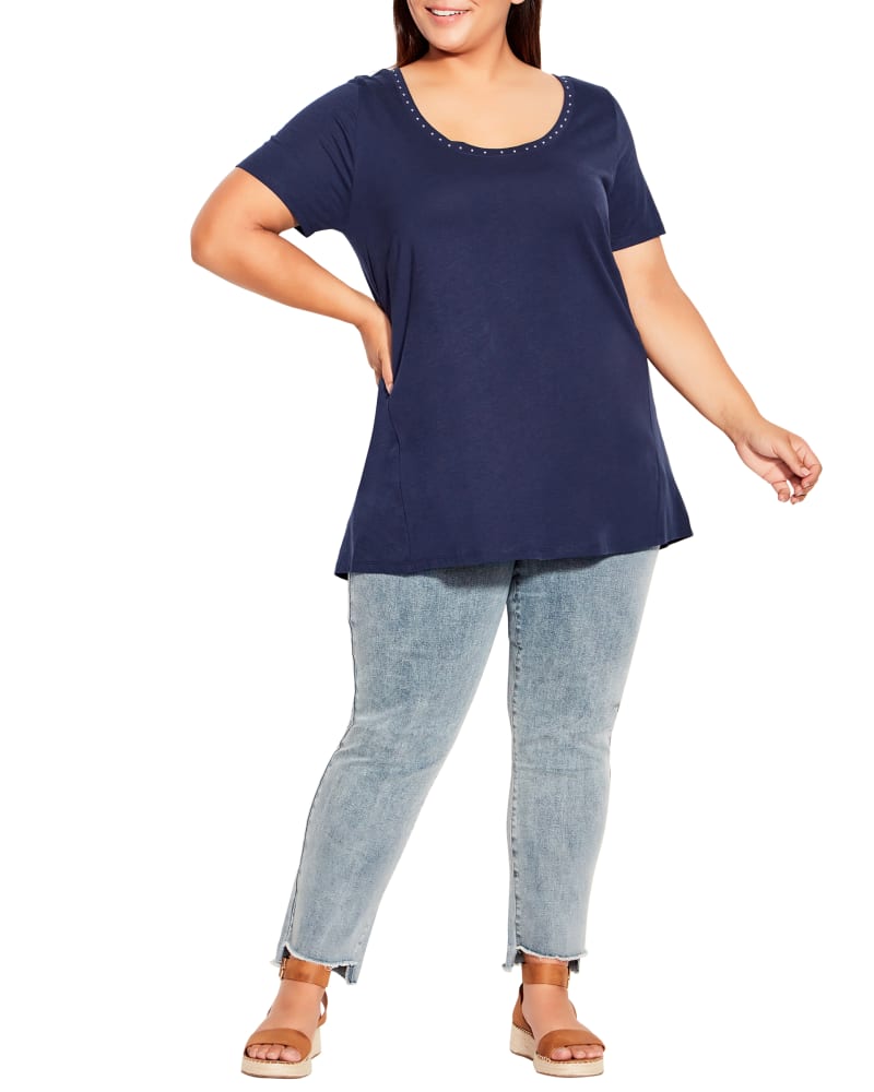 Front of a model wearing a size 14 Nova Swing Trim Top in Navy by avenue. | dia_product_style_image_id:214107